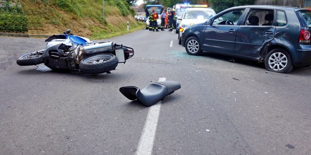 Car accident scene with emergency responders - Harrisburg car injury attorney